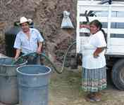 03-01-08 Don Pedro delivering water - Photo by Daniel